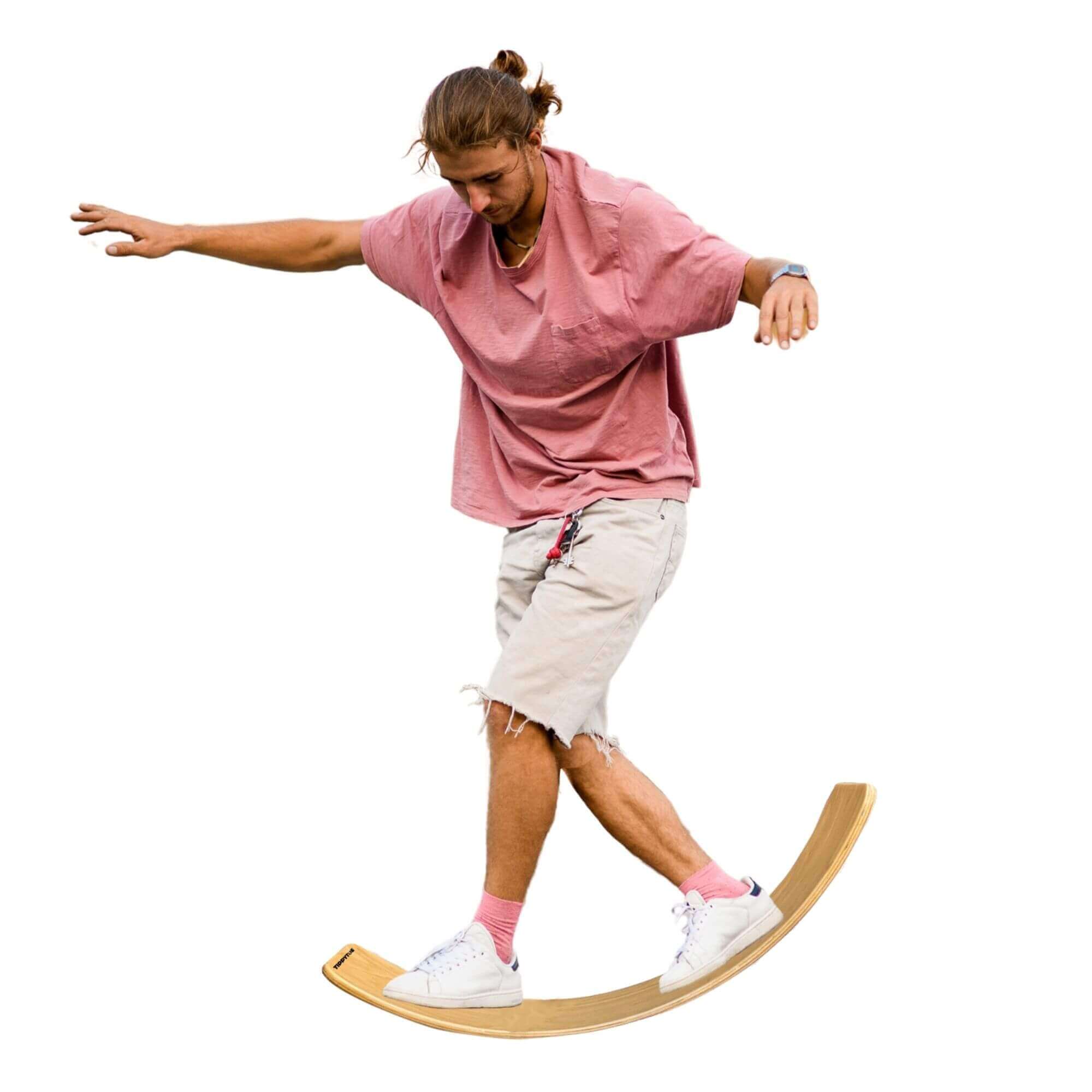 Person balancing on BILLY Wooden Balance Board, ideal for kids and adults, yoga exercises, and improving balance skills.